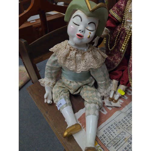 416 - Harlequin Florindo doll with one other. Both have ceramic heads/ hands/ feet.  Tallest 51cm.