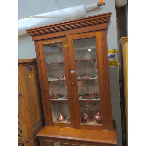 427 - Tall glazed mahogany book case (3 upper shelve) Lower cupboard has internal shelf. Key present &... 