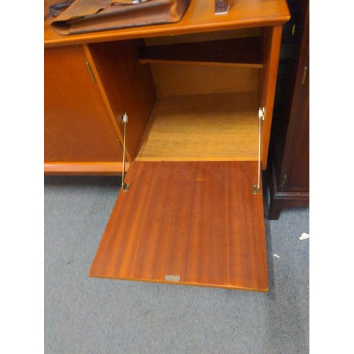 436 - Large mid century teak sideboard with two drawers, two cupboard doors and one drop/drinks cabinet do... 