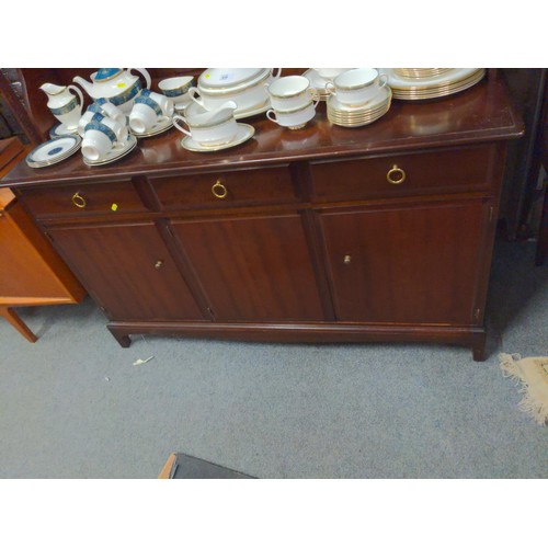 437 - Modern large Stag dresser with three doors and two plate rack shelves.