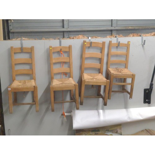 428 - Four rush seated dining chairs