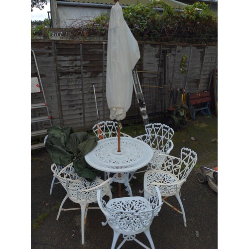 832 - White painted cast aluminium garden table and six chairs, with parasol