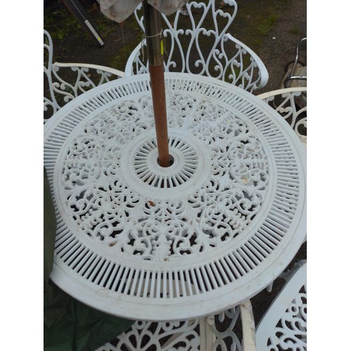 832 - White painted cast aluminium garden table and six chairs, with parasol