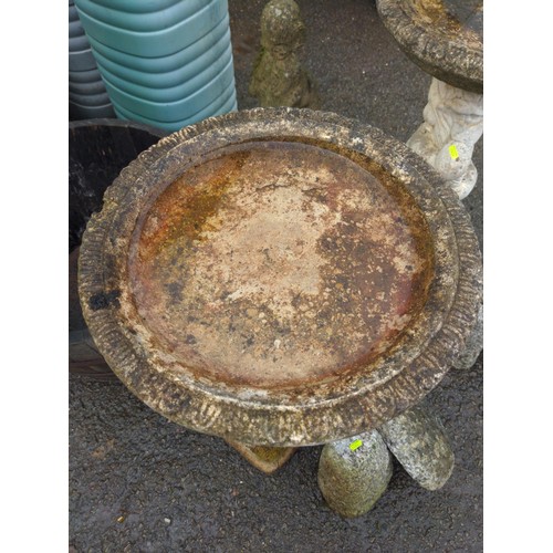 845 - Putto supported concrete bird bath, height 90cm