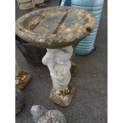 846 - Putto supported concrete bird bath, height 90cm