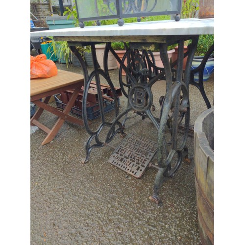 851 - Cast iron sewing treadle base (Bradbury) with marble top, 99cm wide, 43cm deep, 77cm high