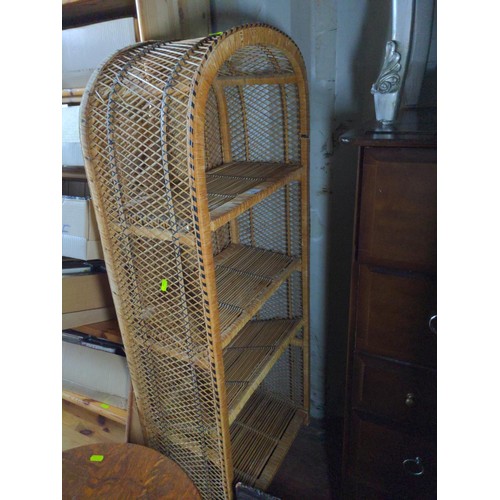 524 - Dome topped wicker shelf unit. H130cm W56cm. Areas of damage/loss to wrapping.