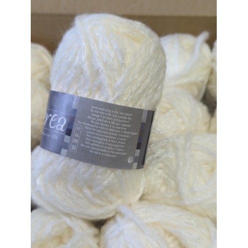 595 - 50 x 25gms antique ivory yarn