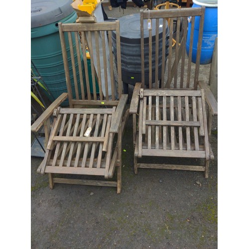 916 - Two teak steamer chairs