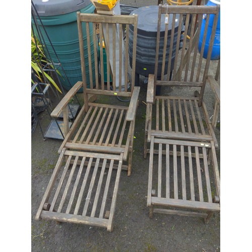 916 - Two teak steamer chairs