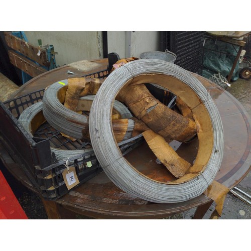 725 - 4 unused rolls of galvanised wire