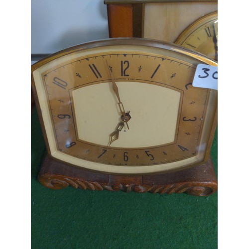 306 - Garrard 8 day clock  & 2 barometers & 8 day Metamec clock.