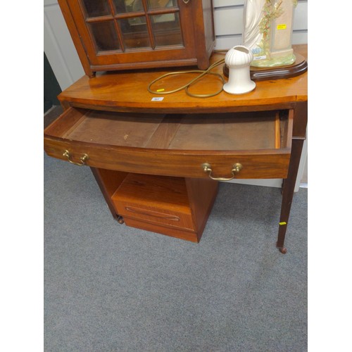 361 - Hard wood bow fronted single drawer side table with original ceramic castors and brass drawer handle... 