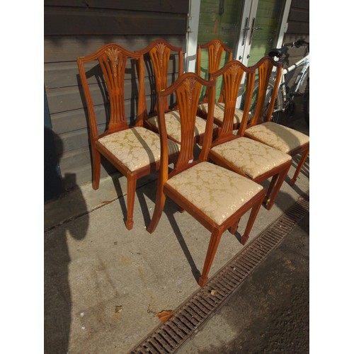 431A - Set of six dining chairs in mahogany with upholstered seats.