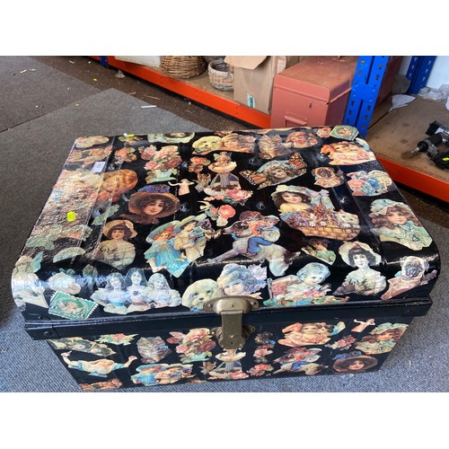 705 - Japanned steel travelling trunk with decoupage decoration outside and blue inside.  70 x 51 x 45 cms