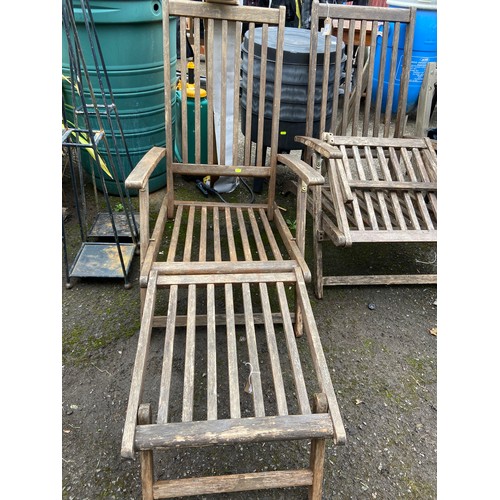 916 - Two teak steamer chairs