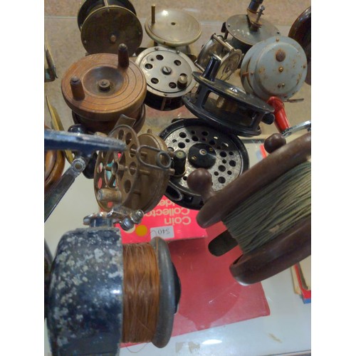 Collection of vintage fishing reels, wood, bakalite and brass plus three  modern reels. Inc, KP Morri