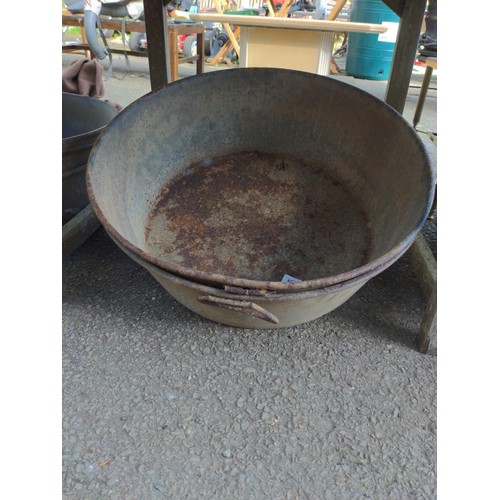 85 - Two large round galvanised tub/planters