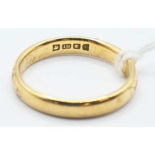 62 - 18ct gold band, size R, gross weight 4.90 grams