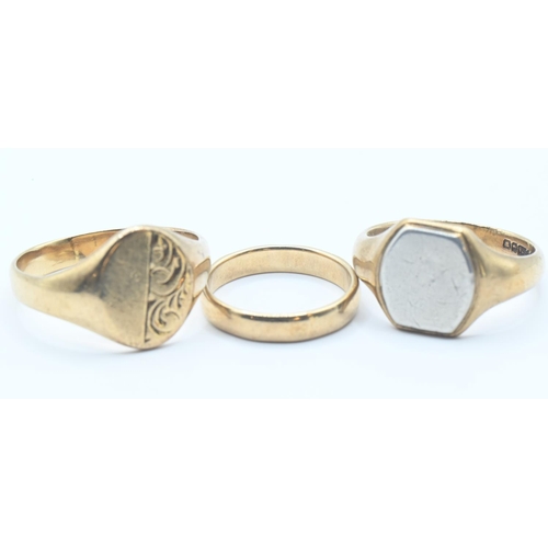 73 - Two 9ct gold signet rings and a gold band. Sizes Y, S/T & L respectively. Gross weight 16.93g