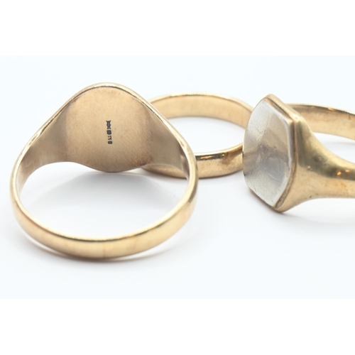 73 - Two 9ct gold signet rings and a gold band. Sizes Y, S/T & L respectively. Gross weight 16.93g