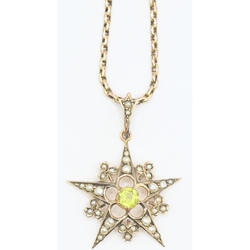 92 - Edwardian 9ct gold starburst pendant set with peridot and seed pearls. 9ct gold chain 430mm circumfe... 