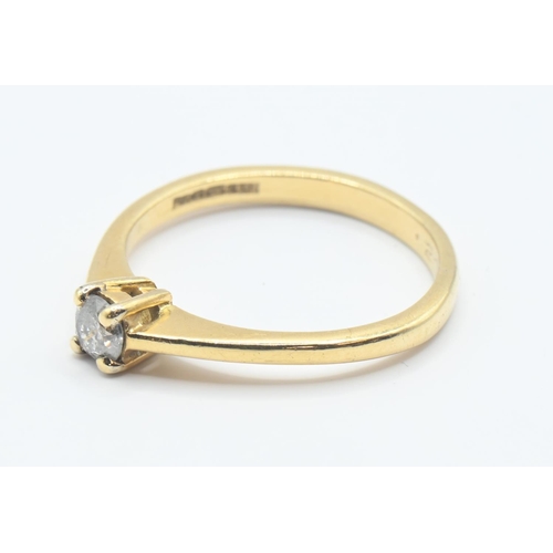 93 - 18ct gold and diamond solitaire ring. Marked .20 carat. gross weight 2.41g Size L/M.