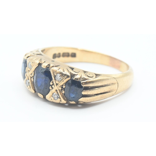 106 - 9ct gold trilogy ring set with topaz and small diamonds. gross weight 4.07g. Size M/N