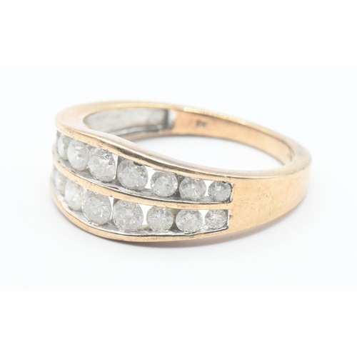 114 - 9ct gold ring channel set with two rows of diamonds (18 total). Size O/P. Gross weight 3.2g