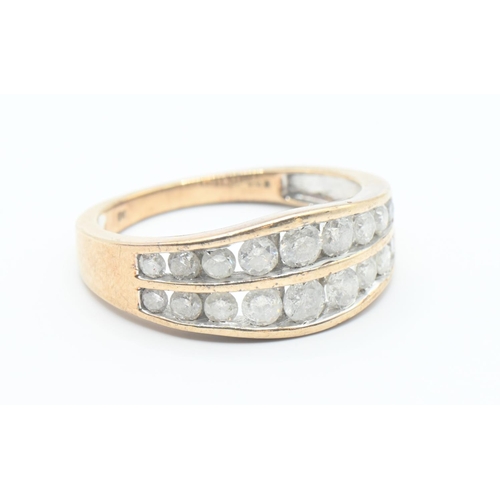 114 - 9ct gold ring channel set with two rows of diamonds (18 total). Size O/P. Gross weight 3.2g