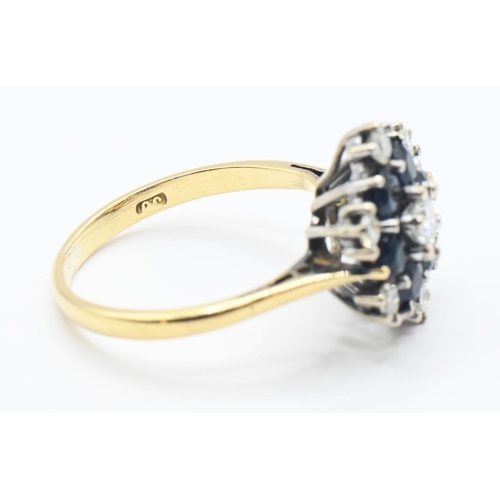 120 - Sapphire and diamond cluster ring central diamond 3.5mm diameter, size K 1/2. Gross weight 3.64g.