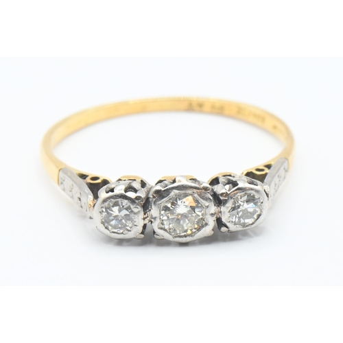 121 - 18ct gold and diamond trilogy ring Size M/N. Gross weight 1.8g.