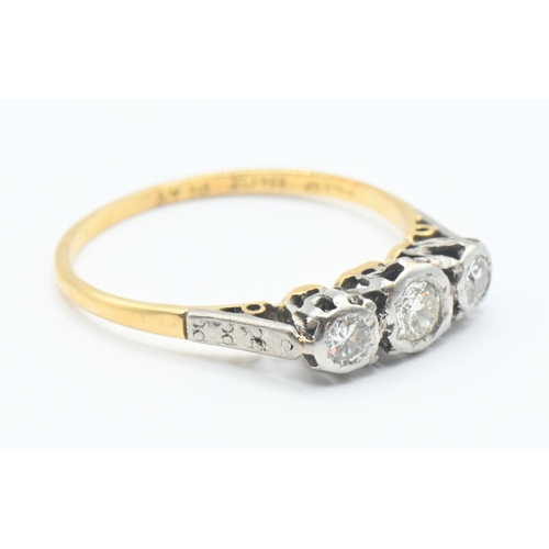 121 - 18ct gold and diamond trilogy ring Size M/N. Gross weight 1.8g.