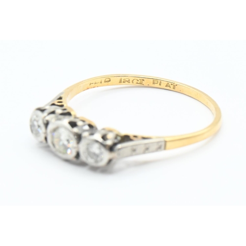 121 - 18ct gold and diamond trilogy ring Size M/N. Gross weight 1.8g.