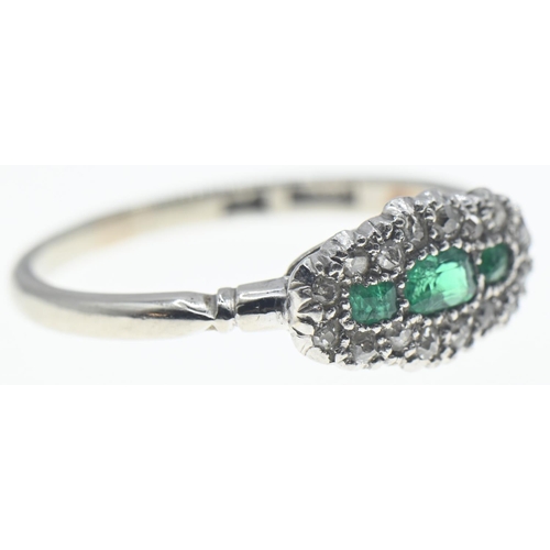 124 - 18ct white gold, emerald and diamond ring, size N, gross weight 2.9 grams