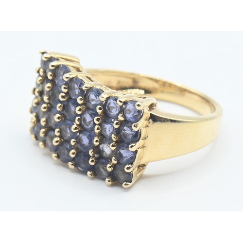 127 - 14ct gold and tanzanite stone ring, size N1/2, gross weight 5.9 grams