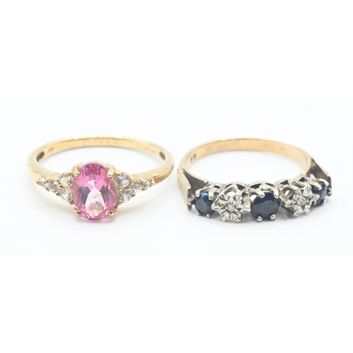 130 - Two 9ct gold rings one set with central oval pink topaz flanked with white stones, size O/P and blue... 