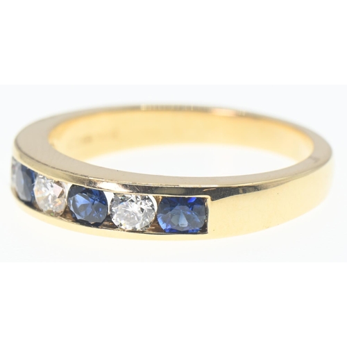 135 - 18ct gold, diamond and sapphire half hoop ring, size O, gross weight 4.66 grams