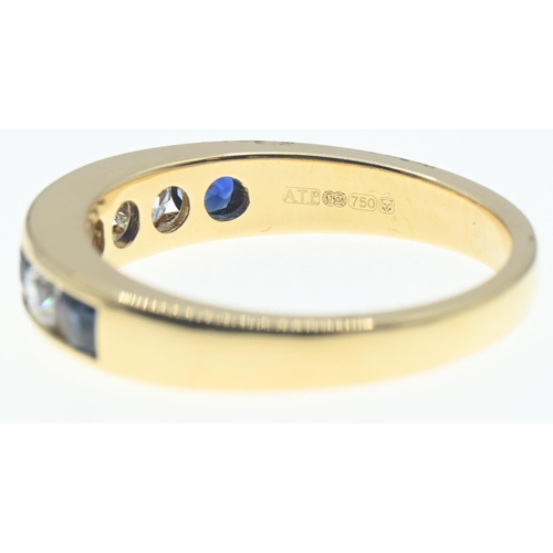 135 - 18ct gold, diamond and sapphire half hoop ring, size O, gross weight 4.66 grams