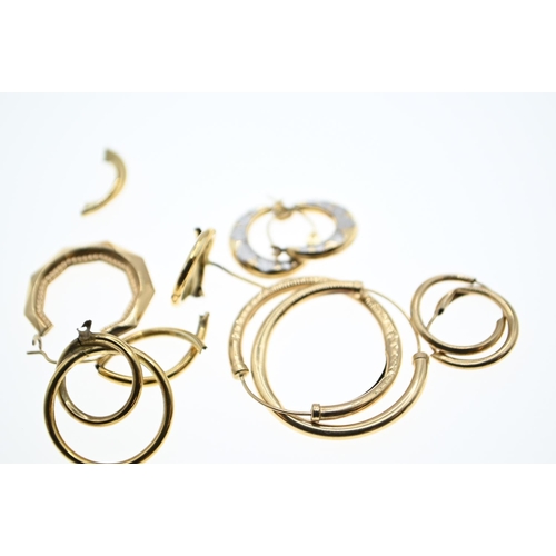 147 - Three pairs of yellow metal hoop earrings together with additional scrap yellow metal earrings, all ... 