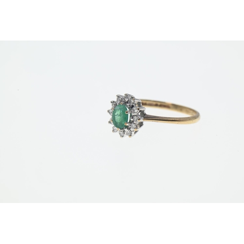 185 - 9ct gold,  emerald and diamond cluster ring, size J. 1.38g