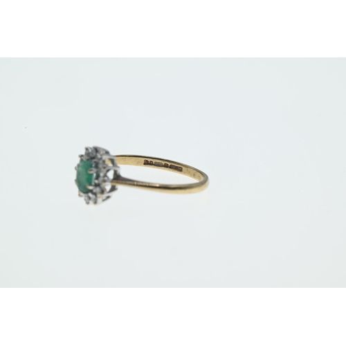 185 - 9ct gold,  emerald and diamond cluster ring, size J. 1.38g