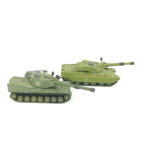 367 - Two Dinky Military tanks and two Dinky war planes. Chieftain tank 155mm mobile gun. Leopard tank. Sp... 