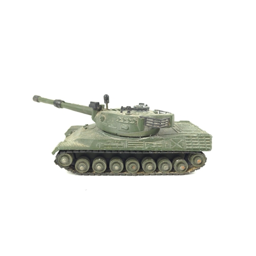 367 - Two Dinky Military tanks and two Dinky war planes. Chieftain tank 155mm mobile gun. Leopard tank. Sp... 