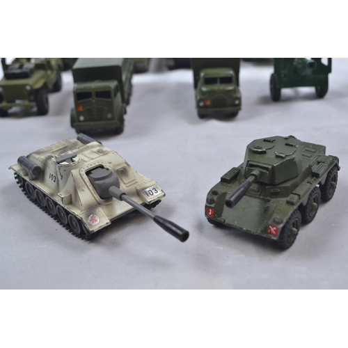 372 - Collection of military toy vehicles Inc. Corgi & Dinky Tanks, planes, guns + other vehicles