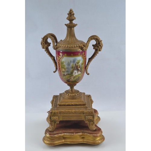 441 - Gilt metal and hand painted porcelain three piece mantle clock garniture, late C19th/early C20th, th... 