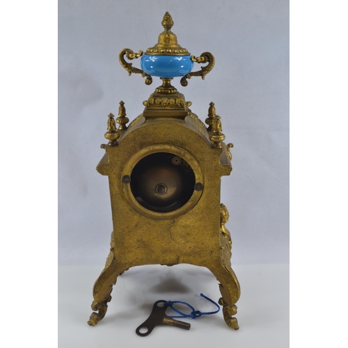 442 - Gilt metal and hand painted porcelain three piece mantle clock garniture, late C19th/early C20th, de... 