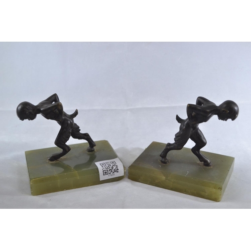 447 - Pair of bronze and onyx faun bookends, height 11.5cm, length 13cm