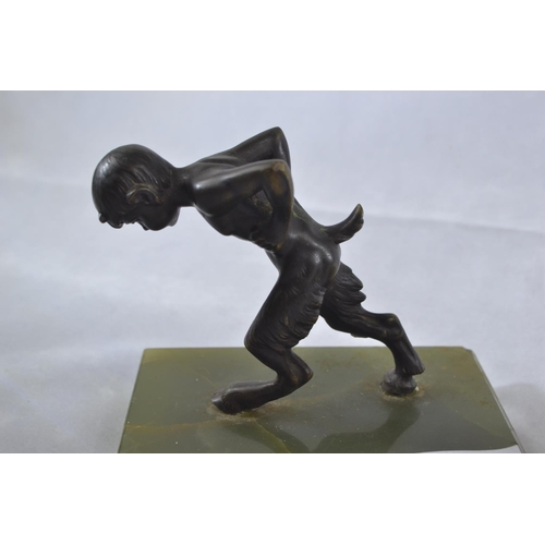 447 - Pair of bronze and onyx faun bookends, height 11.5cm, length 13cm