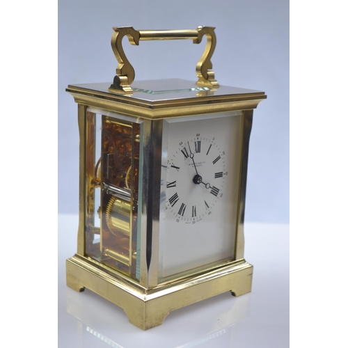 452 - Brass plated and glass 8 day striking carriage clock by W.Wray and Co. Plymouth, 11 jewels, W10 x D8... 